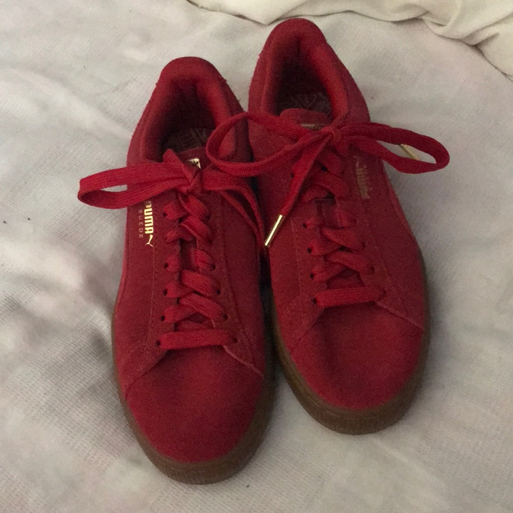 Red suede women’s pumas